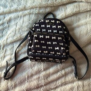kate spade small black and white  bow backpack